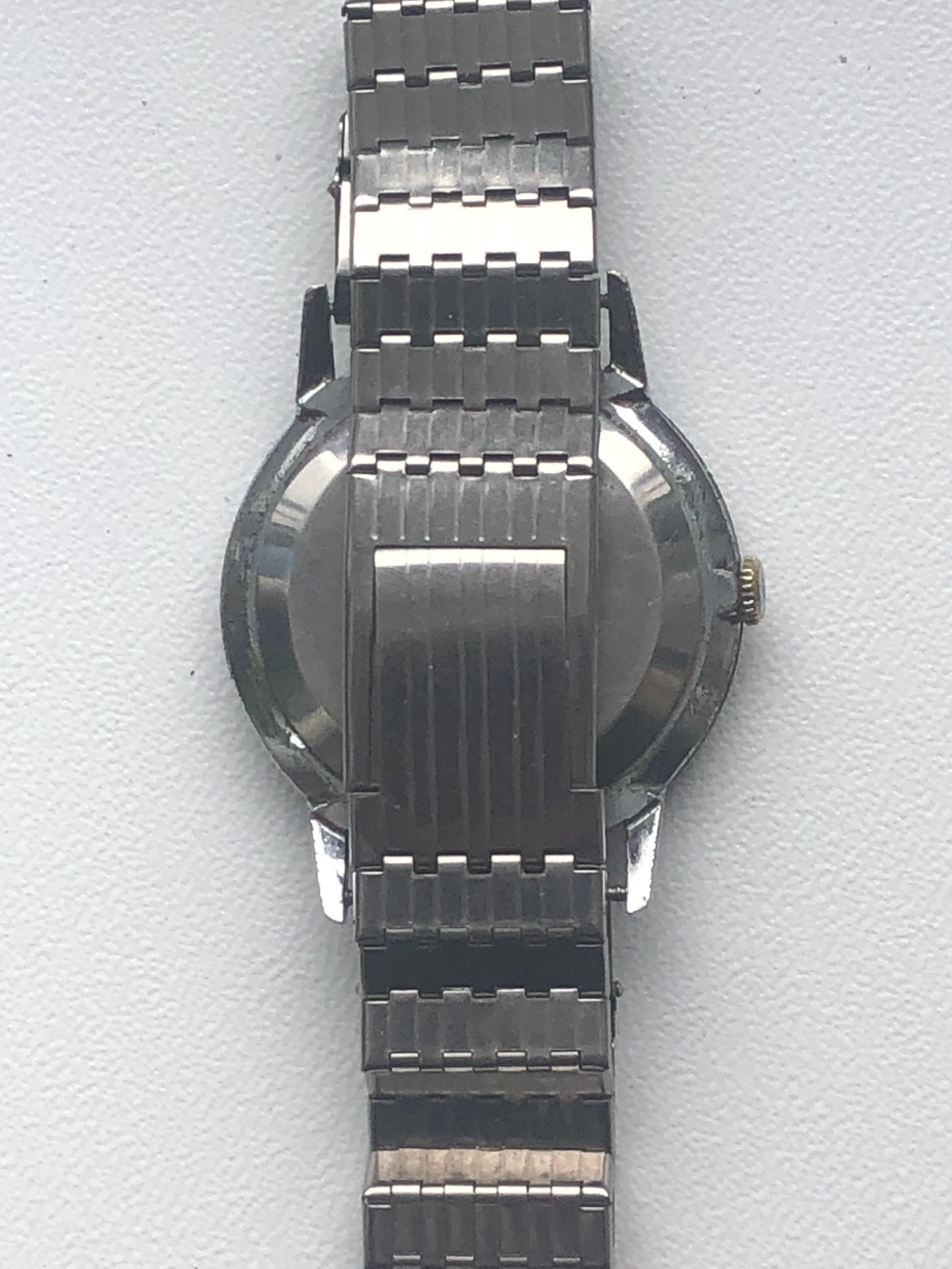 Montre Raketa USSR Vintage 1960 - Mécanique Manuelle, 16 Rubis, Cadran Multicolore