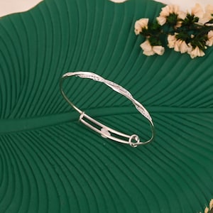 Sterling Silver Twisted Bangle: Cubic Zirconia Adjustable Bracelet