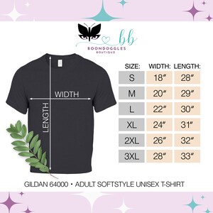 May include: A black unisex t-shirt with size chart showing width and length measurements in inches. The chart includes sizes S, M, L, XL, 2XL, and 3XL. The text "GILDAN 64000 ADULT SOFTSTYLE UNISEX T-SHIRT" is at the bottom of the image.