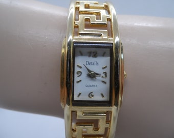 Vintage Details Art Deco Inspired Design Spring Hinged Cuff Bracelet Gold Tone Ladies Quartz Watch DTL2023032 Japan Movement, 1980&#39;s