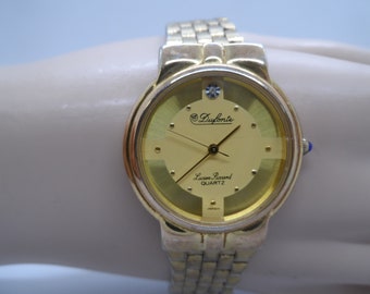 Lucien Piccard Stainless Steel Gold Tone Sapphire Bezel  display picture 1