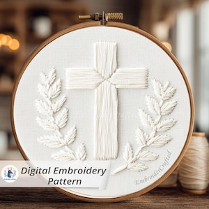 May include: White embroidered cross and leaf design on a cream-colored fabric, set within a wooden embroidery hoop. The text "Digital Embroidery Pattern" is displayed on the bottom left. The design is a digital embroidery pattern.