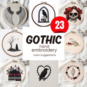 May include: A collection of Gothic-themed hand embroidery designs in wooden hoops. Designs include angel wings, a raven on a skull, a skull with flowers, a tree with a figure, a raven on a branch, a heart with a raven, and a skeleton hand. The text "GOTHIC hand embroidery color suggestions" is also present.