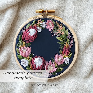 May include: Embroidered floral pattern in a wooden hoop. The design features pink and red flowers with green leaves on a navy blue background. The text "Handmade pattern template" and "The design in 6 size" are visible.
