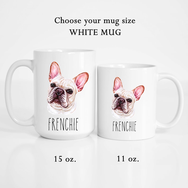 May include: Two white ceramic mugs with a French Bulldog design. The mugs feature a watercolor illustration of a Frenchie's face, with the word "FRENCHIE" below. The larger mug is 444 ml, and the smaller is 325 ml. Text at the top reads "Choose your mug size WHITE MUG".