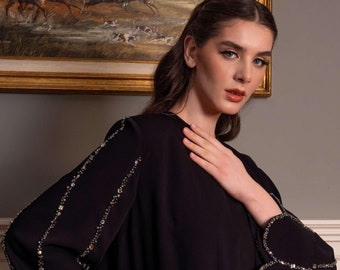 Abaya aangepast formaat met mouwdetails