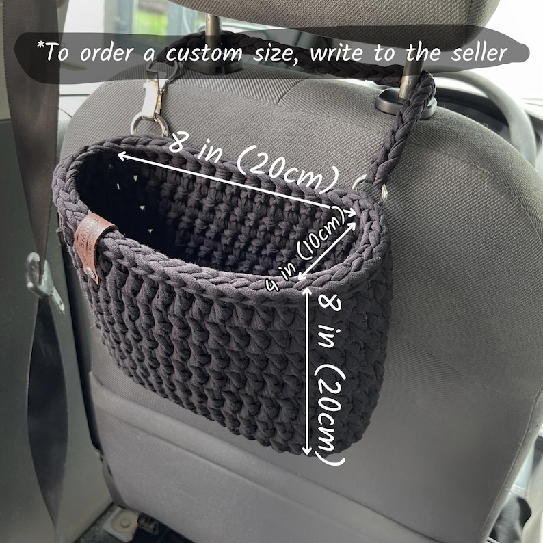 In the photo is a basket crocheted from t-shirt yarn, which can be hung on the headboard of the car seat. The strap is attached with a strong metal button. Suitable for collecting small trash or for storing napkins, water or other personal items.