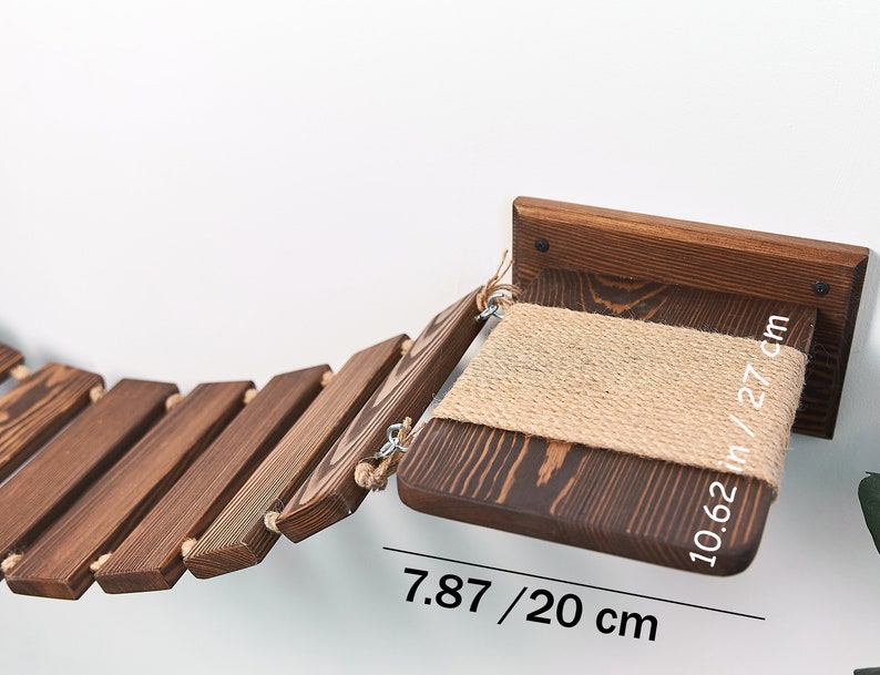 May include: A wooden cat bridge with a sisal-covered platform. The bridge is 7.87 inches (20 cm) long and the platform is 10.62 inches (27 cm) wide.