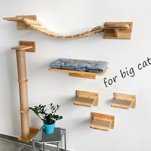 May include: A wooden cat tree with a bridge, a scratching post, and multiple platforms. The platforms are covered in sisal rope and the bridge is made of wood slats. The cat tree is designed for big cats.