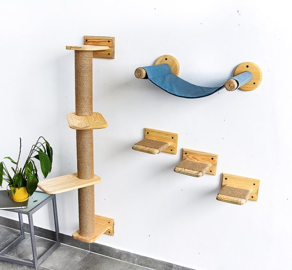 Muebles de pared para gatos y árbol de actividades para gatos con poste  rascador, parque infantil de madera natural para gatos montado en la pared  con cojín suave -  España