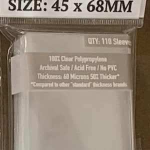 May include: Clear plastic card sleeves from Sleeve Kings, labeled as Mini Euro Card Sleeves, with dimensions of 45 x 68mm. The package indicates 110 sleeves, made of clear polypropylene, archival safe, and acid-free.