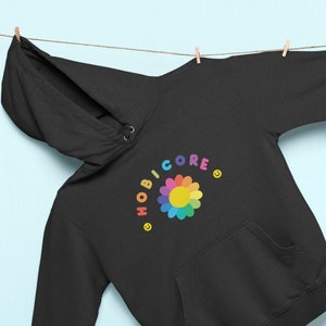 Sudadera unisex con capucha Flower Hobicore Hope World / Tienda Hobihearteu / hobipalooza