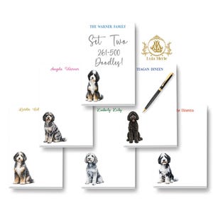 May include: A collection of white rectangular notepads featuring various dog illustrations, personalized names in different colors, and the text "THE WARNER FAMILY Set Two 261-500 Doodles!" alongside a gold logo and a black and gold ballpoint pen.