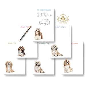 May include: A collection of white rectangular notepads featuring watercolor illustrations of Shih Tzu dogs. Each notepad displays a unique name or text, including THE WARNER FAMILY Set One 1-180 Dogs!, Angela Warner, Linda, Ed, Kimberly Kirby, and TEAGAN DINEEN.