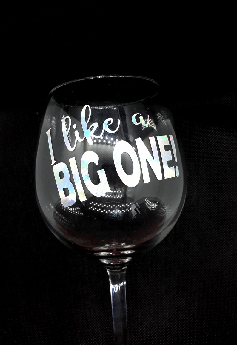 large wine glass that has 'I like a big one' etched on it