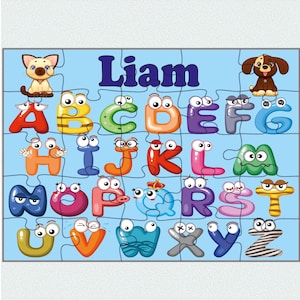 May include: A colorful alphabet puzzle with the name "Liam" at the top. Each letter is a different color and has cartoon eyes. The puzzle pieces are arranged on a light blue background, with cartoon animals at the top.