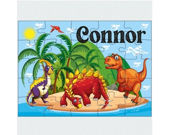 May include: A colorful jigsaw puzzle featuring three dinosaurs on a tropical island. The puzzle is titled "Connor".