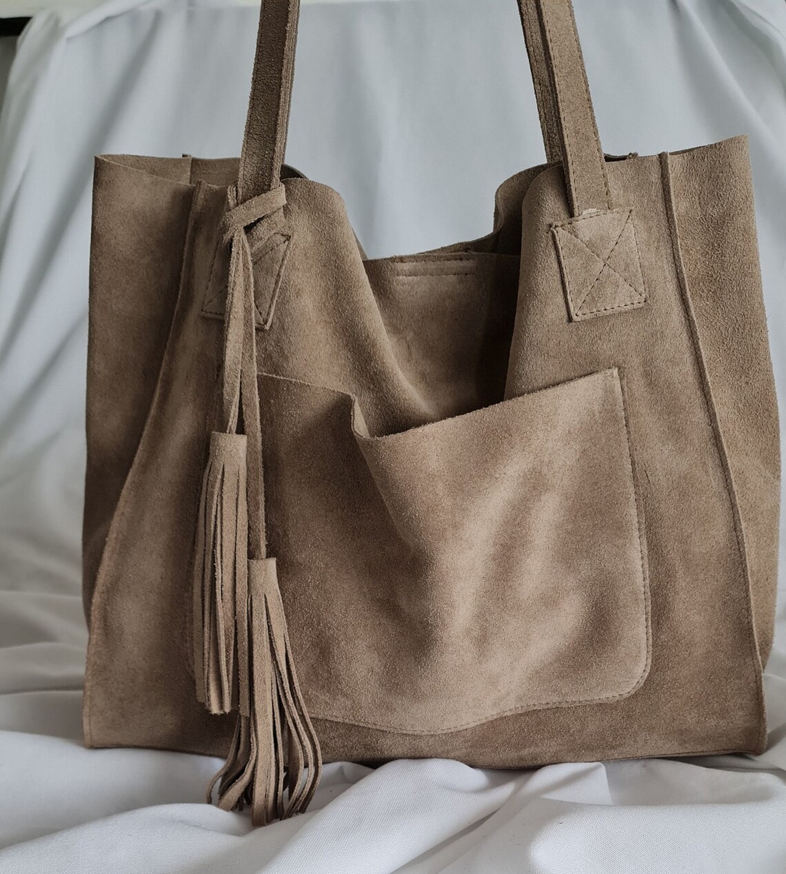 Dark grey large suede leather shoulder bag with tassels