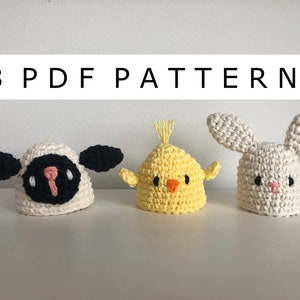 Puede incluir: Tres patrones de amigurumi de crochet: un cordero blanco, un pollito amarillo y un conejito blanco. Los patrones están disponibles para descargar en PDF.