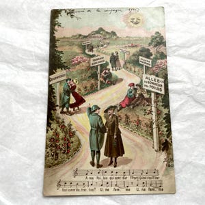 May include: A vintage postcard illustration depicting a winding path labeled Allée du Bonheur des Poilus, featuring couples in early 20th-century attire, directional signs, a sun with a face, and musical notation with French lyrics at the bottom.