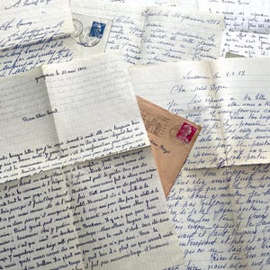 May include: A collection of vintage handwritten letters on lined and unlined paper, featuring cursive French script in blue ink. Several pages include dates, handwritten addresses, and postage stamps in red and blue, layered to show overlapping text.