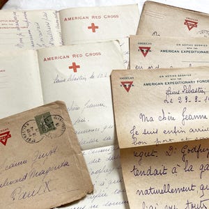 Década de 1910 - Historia de Jeanne - 2 cartas recibidas por Jeanne - En papel membretado oficial de la Cruz Roja Estadounidense y la Fuerza Expedicionaria Estadounidense (A.E.F.)