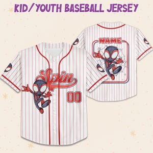 May include: White and red pinstripe baseball jersey with a cartoon character graphic. The jersey features the word "Spin" in red script, the number "00", and a character illustration. The back of the jersey has a matching graphic and space for a name.