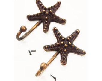Gancio a forma di stella marina in ottone massiccio, decorazione costiera vintage, casa al mare, ferramenta artigianale, coppia di ganci da parete