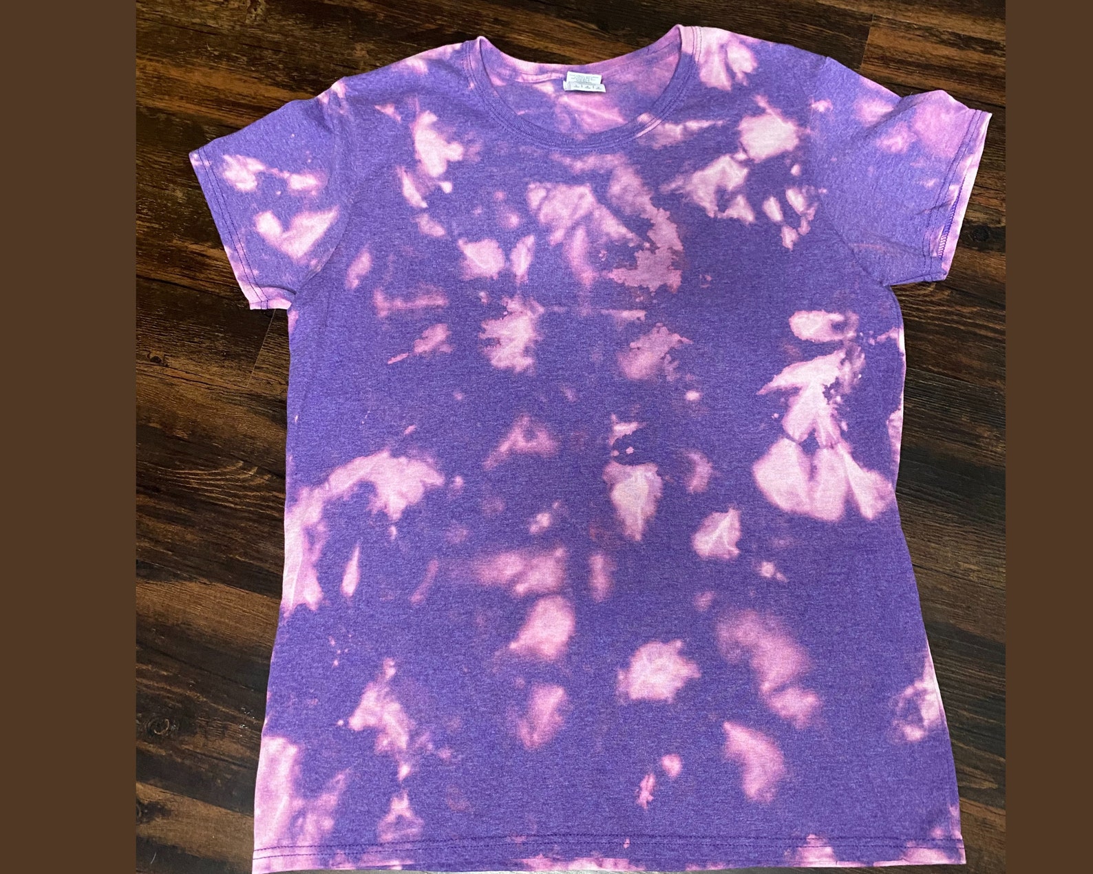 reverse tie dye purple shirt