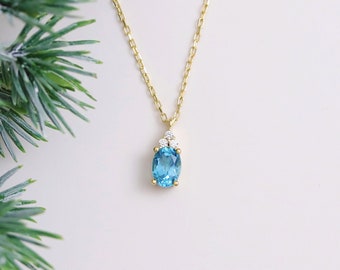 Solid Gold Swiss Blue Topaz Necklace - Dainty Oval Blue Gemstone Pendant