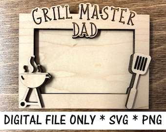 May include: A wooden picture frame with the text "Grill Master Dad" at the top. The frame has a cutout of a grill and spatula on either side of the picture opening.