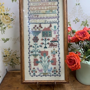 vintage cross stitched sampler 1994 framed France signed M Bryant 17.5” x 9”