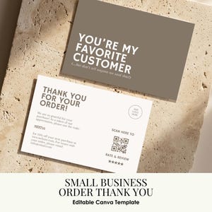 May include: Two rectangular business cards. The top card is taupe with white text reading YOU'RE MY FAVORITE CUSTOMER (...but don't tell anyone we said that!). The bottom card is white with dark text, a QR code, and a five-star rating graphic.