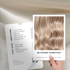 May include: A promotional image for a hair salon, featuring a tablet displaying services and pricing, and a card showcasing blonde hair. The card reads "Blonde Ambition" and "Blonding Specialists". The image includes a QR code and contact information.