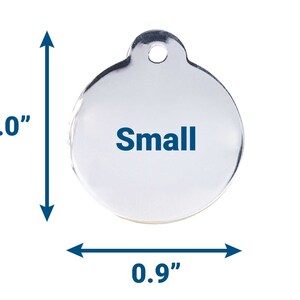 May include: A silver round dog tag with a hole at the top. The tag is 1 inch tall and 0.9 inches wide. The word "Small" is engraved on the tag.