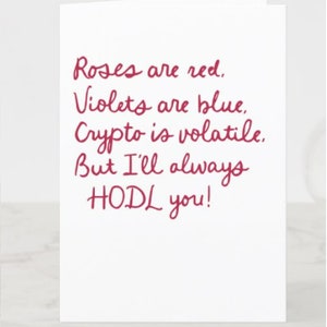 May include: A Valentine's Day card with a handwritten message that reads: "Roses are red. Violets are blue. Crypto is volatile, But I'll always HODL you!"