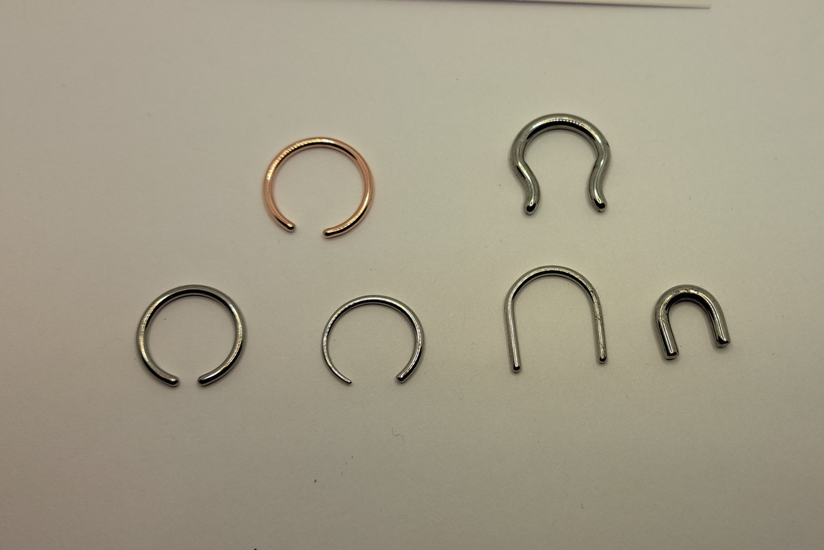 Omega clearance septum ring
