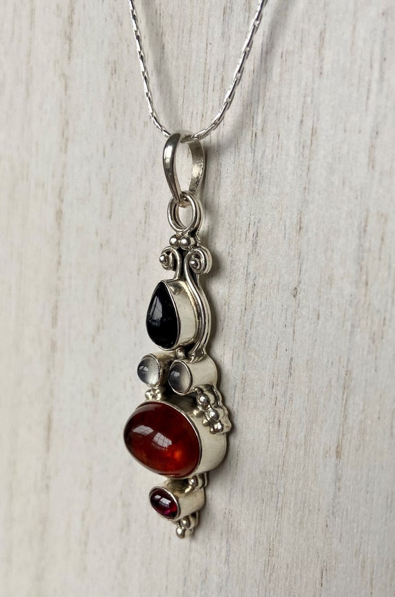 Elegant Sterling Silver Baltic Amber and Black Ony