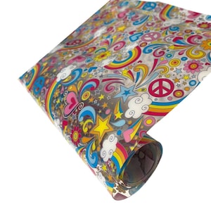 May include: A roll of clear plastic wrap with a colorful psychedelic pattern featuring rainbows, stars, peace signs, hearts, and swirls.