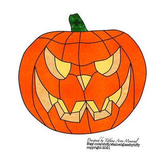 May include: A stained glass pumpkin with a scary face. The pumpkin is orange with black lines and yellow eyes. The pumpkin is designed for a stained glass project.