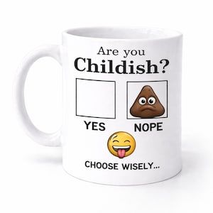 May include: White ceramic mug with the text "Are you Childish?" and a poop emoji. The mug has a handle and the text "YES" and "NOPE" with boxes for checking. The bottom of the mug says "CHOOSE WISELY..."
