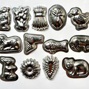 13 Tiny Vintage Metal Chocolate Mold in a box. In various animal and flower shapes, perfect for retro kitchen.