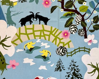 May include: A blue and green patterned fabric with a design of goats, houses, trees, and flowers. The fabric has a light blue background with a white, green, and yellow pattern.