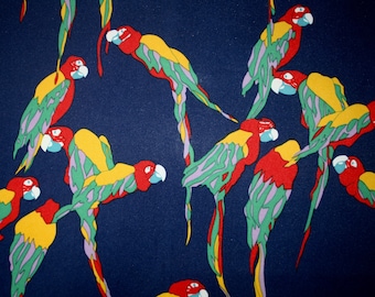 May include: A blue background with a repeating pattern of colorful parrots. The parrots are red, yellow, and green with black eyes and beaks. The parrots are in various positions, some are flying, some are perched, and some are facing different directions.