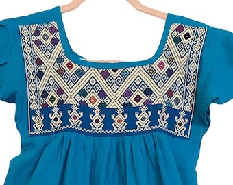 Beautiful Blue Dress Embroidered with designs from Chiapas, Mexico