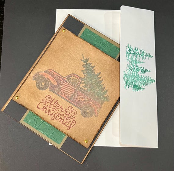 Merry Christmas card, old truck with tree