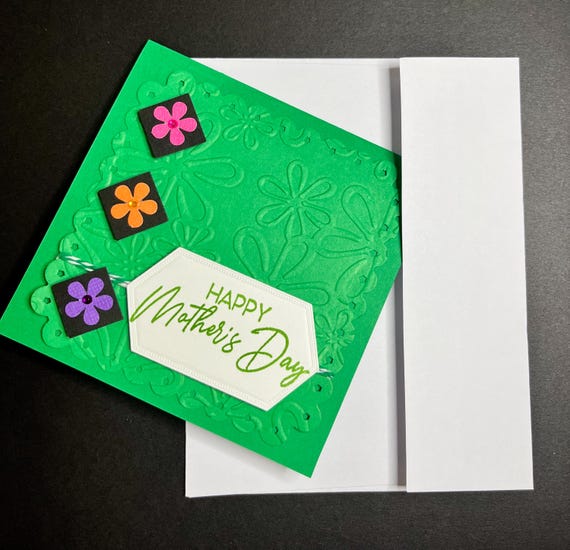 Happy Mothers Day card, embossed daisies and green