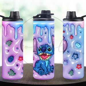 May include: Three insulated water bottles with black lids. The bottles feature a design of a blue cartoon character with large eyes and a wide grin, set against a purple and blue background with floral accents. The bottles are cylindrical and sit on a dark wooden surface.