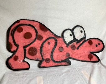Large spray painted character wall hanging