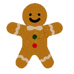 May include: A gingerbread man cookie with a smiling face, green and red buttons, and white icing on the arms and legs.